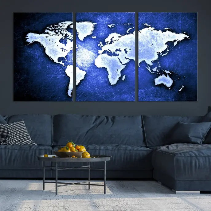 The living room features the Blue Metallic World Map Wall Art Canvas Print on a blue background, showcasing museum-quality canvases with a UV-protective coating, enhancing the modern decor.