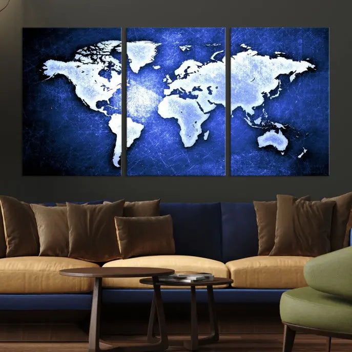 The living room features the Blue Metallic World Map Wall Art Canvas Print on a blue background, showcasing museum-quality canvases with a UV-protective coating, enhancing the modern decor.