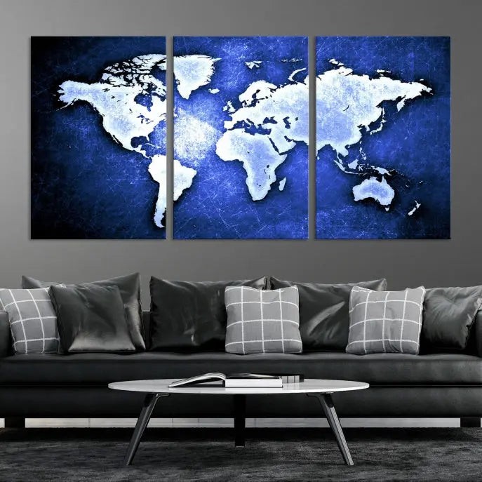 The living room features the Blue Metallic World Map Wall Art Canvas Print on a blue background, showcasing museum-quality canvases with a UV-protective coating, enhancing the modern decor.