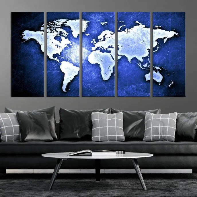 The living room features the Blue Metallic World Map Wall Art Canvas Print on a blue background, showcasing museum-quality canvases with a UV-protective coating, enhancing the modern decor.