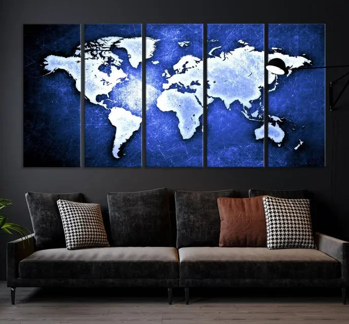 The living room features the Blue Metallic World Map Wall Art Canvas Print on a blue background, showcasing museum-quality canvases with a UV-protective coating, enhancing the modern decor.