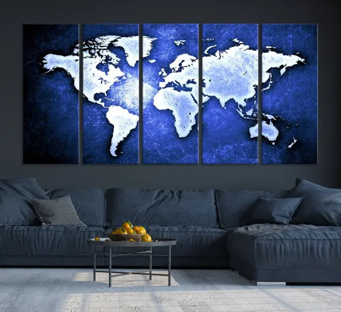 The living room features the Blue Metallic World Map Wall Art Canvas Print on a blue background, showcasing museum-quality canvases with a UV-protective coating, enhancing the modern decor.