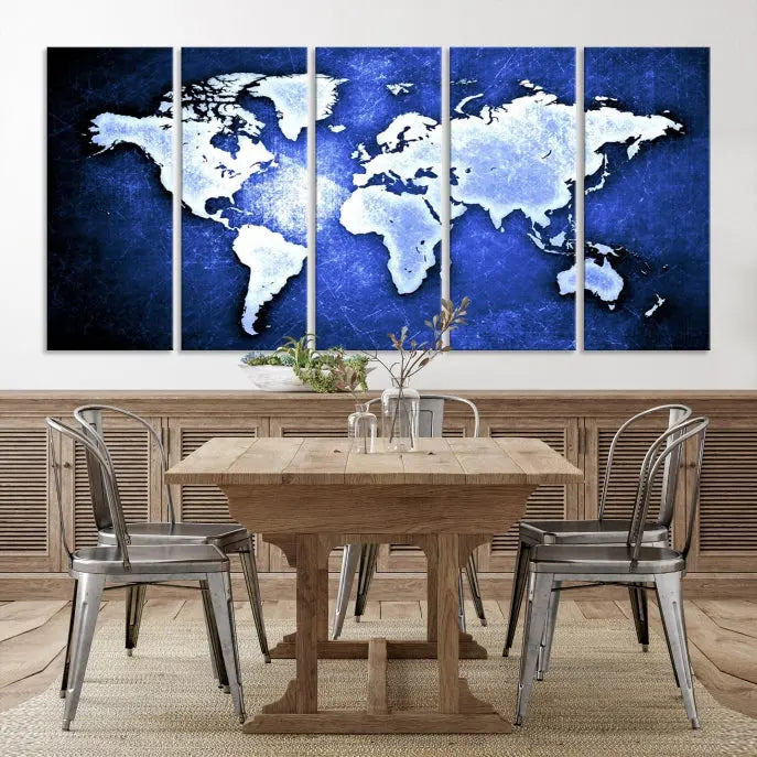 The living room features the Blue Metallic World Map Wall Art Canvas Print on a blue background, showcasing museum-quality canvases with a UV-protective coating, enhancing the modern decor.