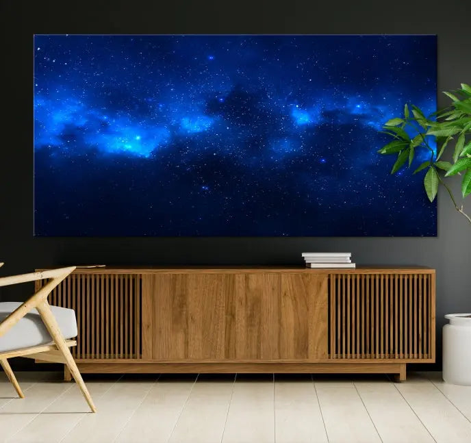 The Blue Nebula Clouds Wall Art Night Sky Stars Canvas Print features a gallery-worthy depiction of a starry night sky. This exquisite canvas artwork brings an exceptional touch to any room, all with the advantage of free shipping.