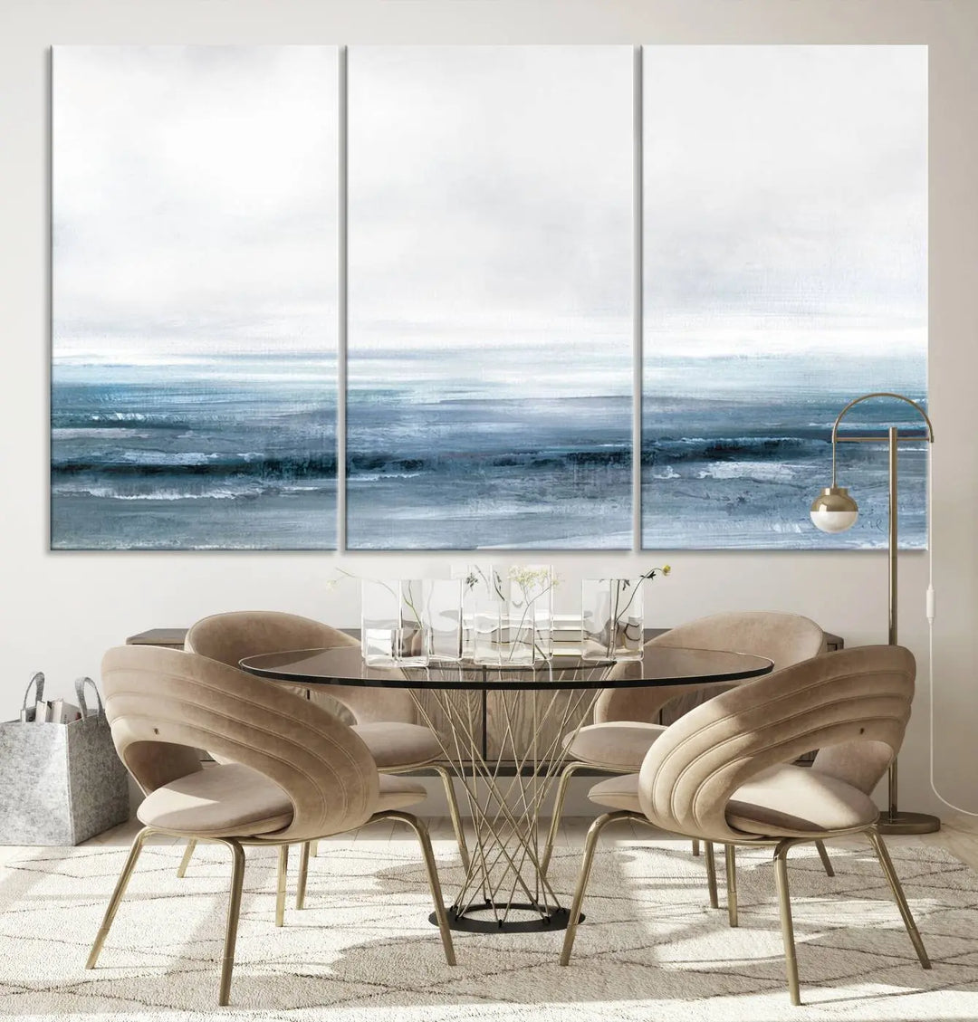 The Blue Ocean Abstract Artwork Wall Art Canvas Print, featuring museum-quality canvas with a gallery wrap and UV-protective coating, enhances the wall in a softly lit room.