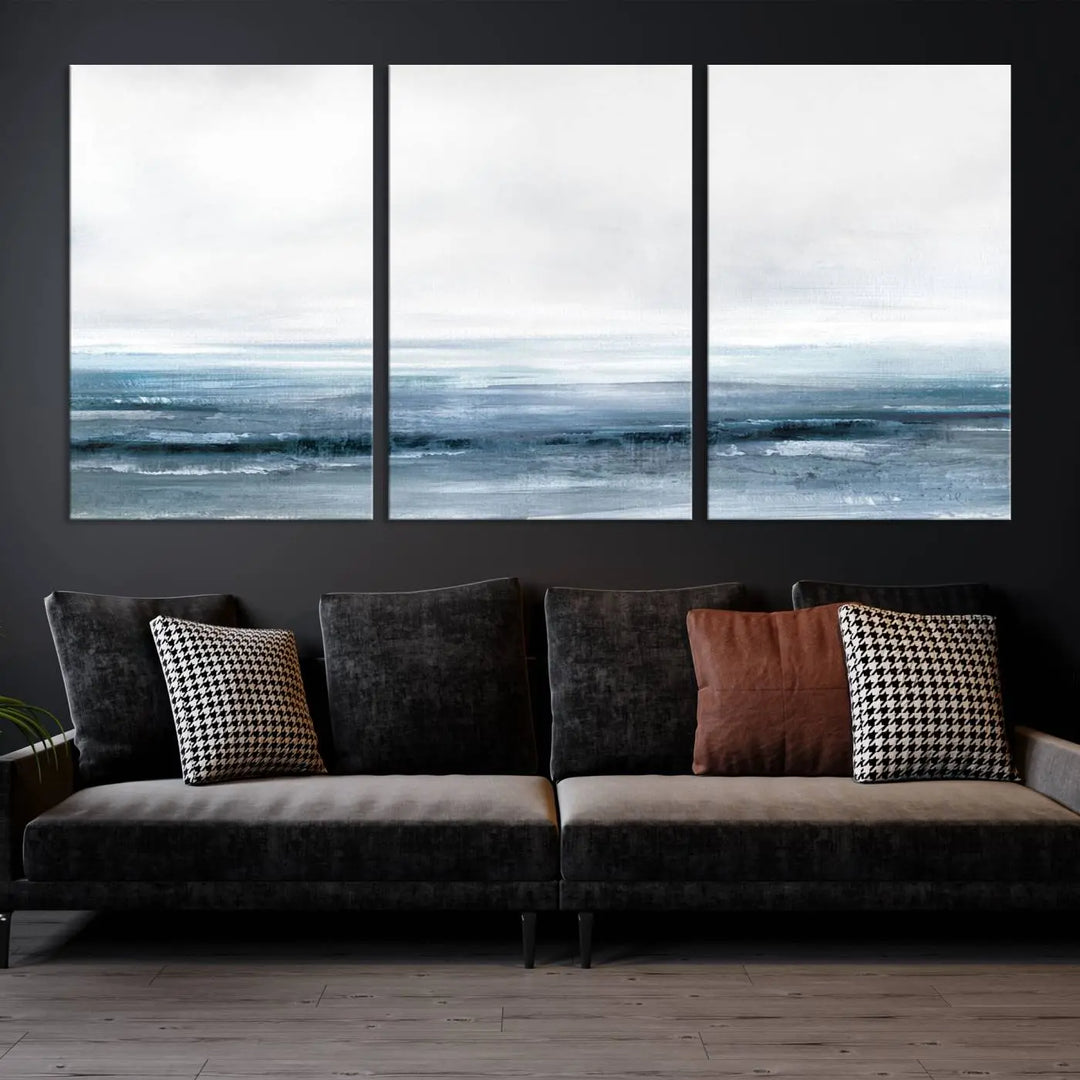 The Blue Ocean Abstract Artwork Wall Art Canvas Print, featuring museum-quality canvas with a gallery wrap and UV-protective coating, enhances the wall in a softly lit room.