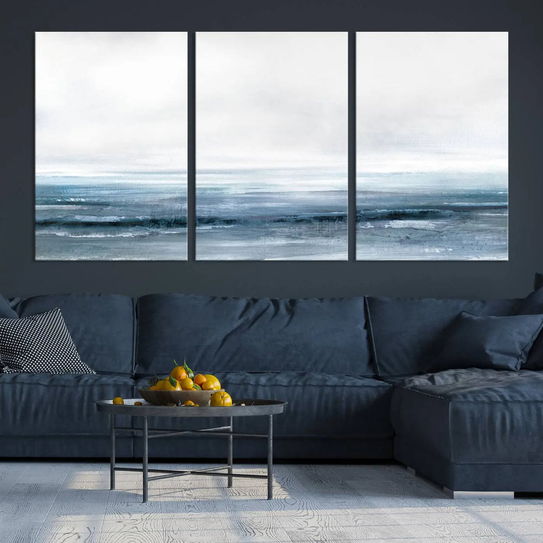 The Blue Ocean Abstract Artwork Wall Art Canvas Print, featuring museum-quality canvas with a gallery wrap and UV-protective coating, enhances the wall in a softly lit room.