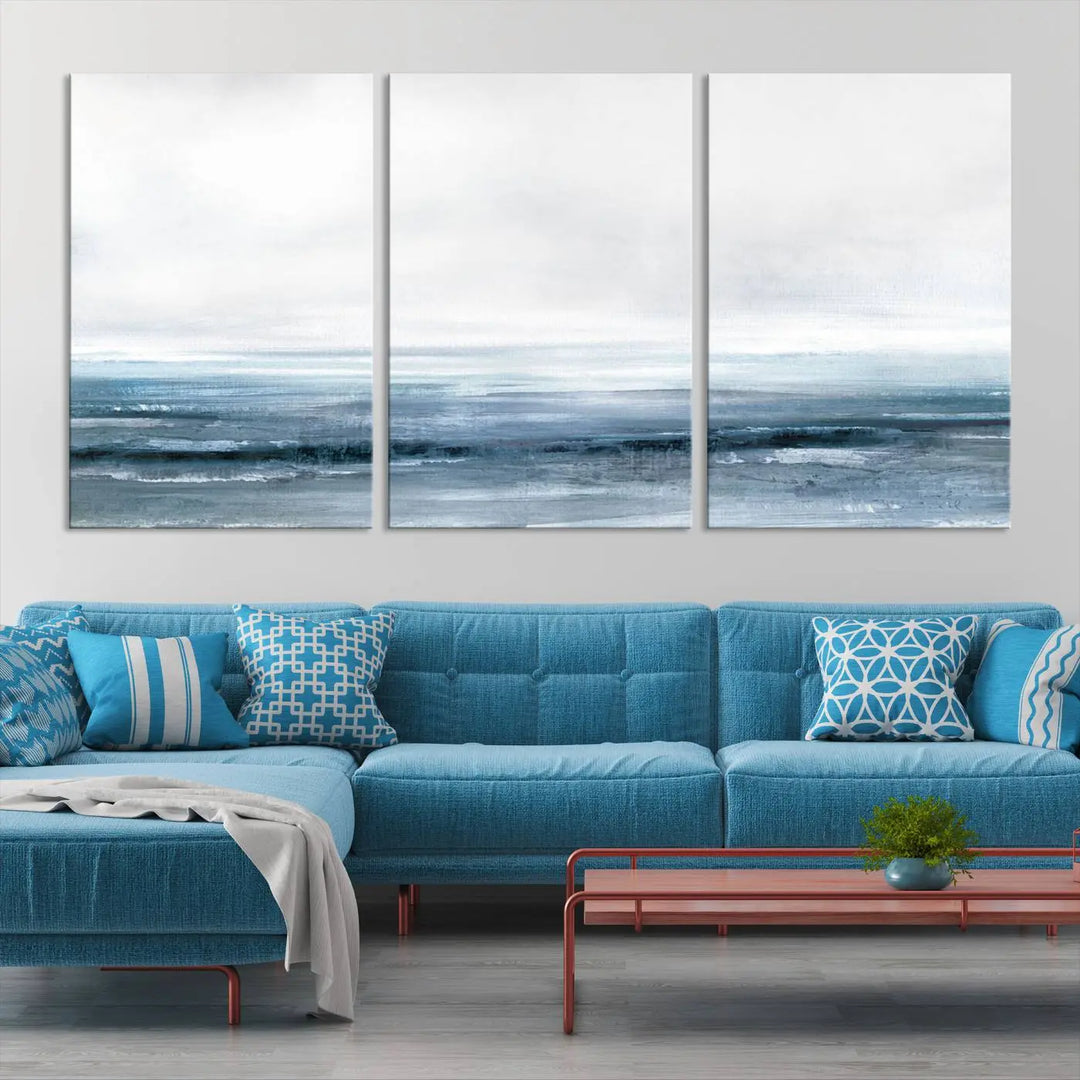 The Blue Ocean Abstract Artwork Wall Art Canvas Print, featuring museum-quality canvas with a gallery wrap and UV-protective coating, enhances the wall in a softly lit room.