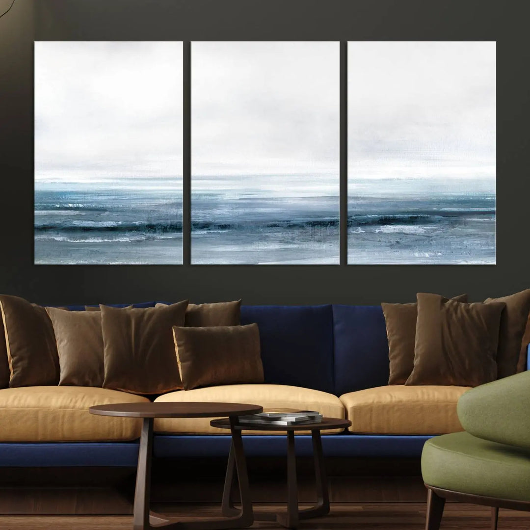 The Blue Ocean Abstract Artwork Wall Art Canvas Print, featuring museum-quality canvas with a gallery wrap and UV-protective coating, enhances the wall in a softly lit room.