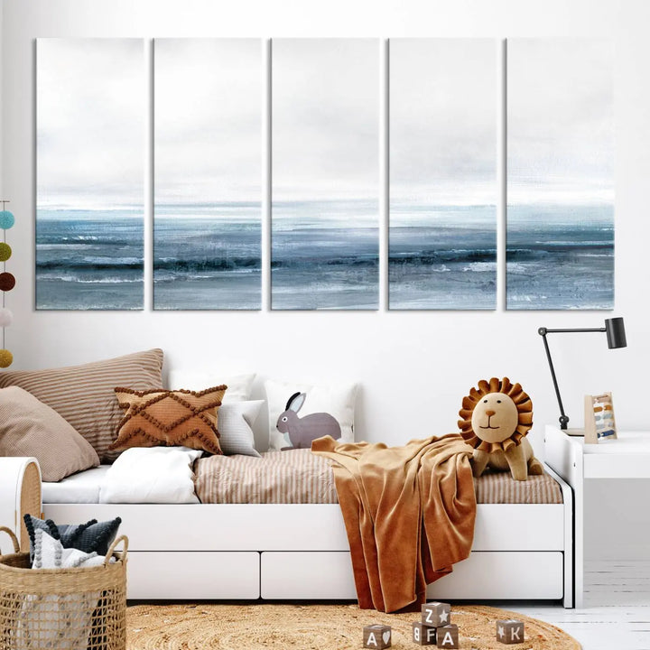 The Blue Ocean Abstract Artwork Wall Art Canvas Print, featuring museum-quality canvas with a gallery wrap and UV-protective coating, enhances the wall in a softly lit room.