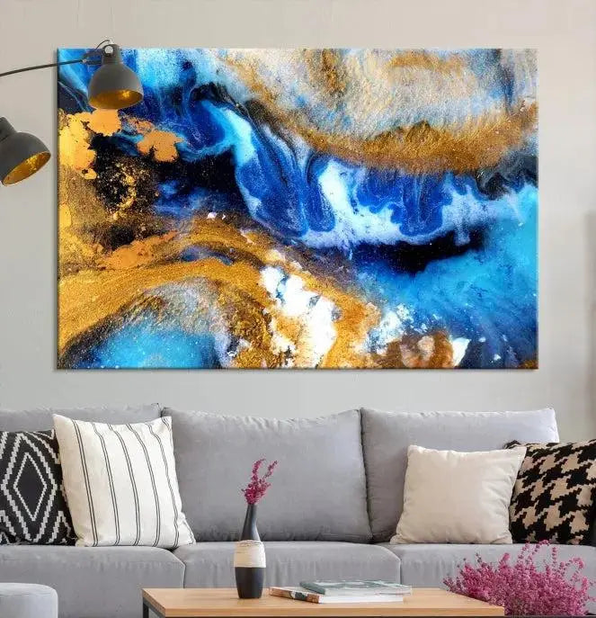 The Blue Orange Marble Fluid Effect Wall Art Abstract Canvas Wall Art Print is displayed on the wall.