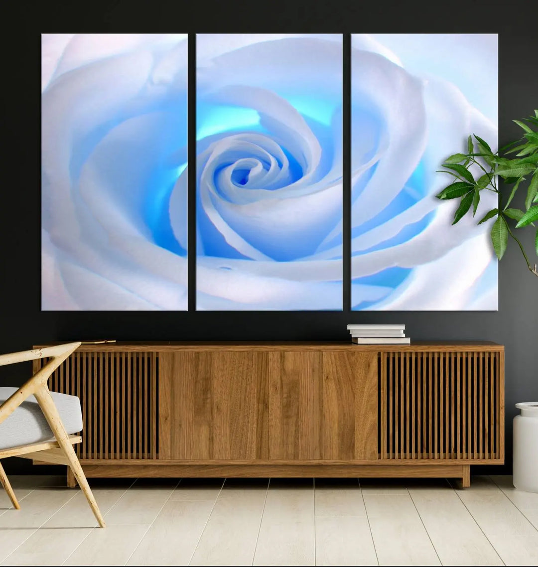 The Blue Rose Wall Art Canvas Print, a museum-quality piece ready to hang, adds charm to the room.