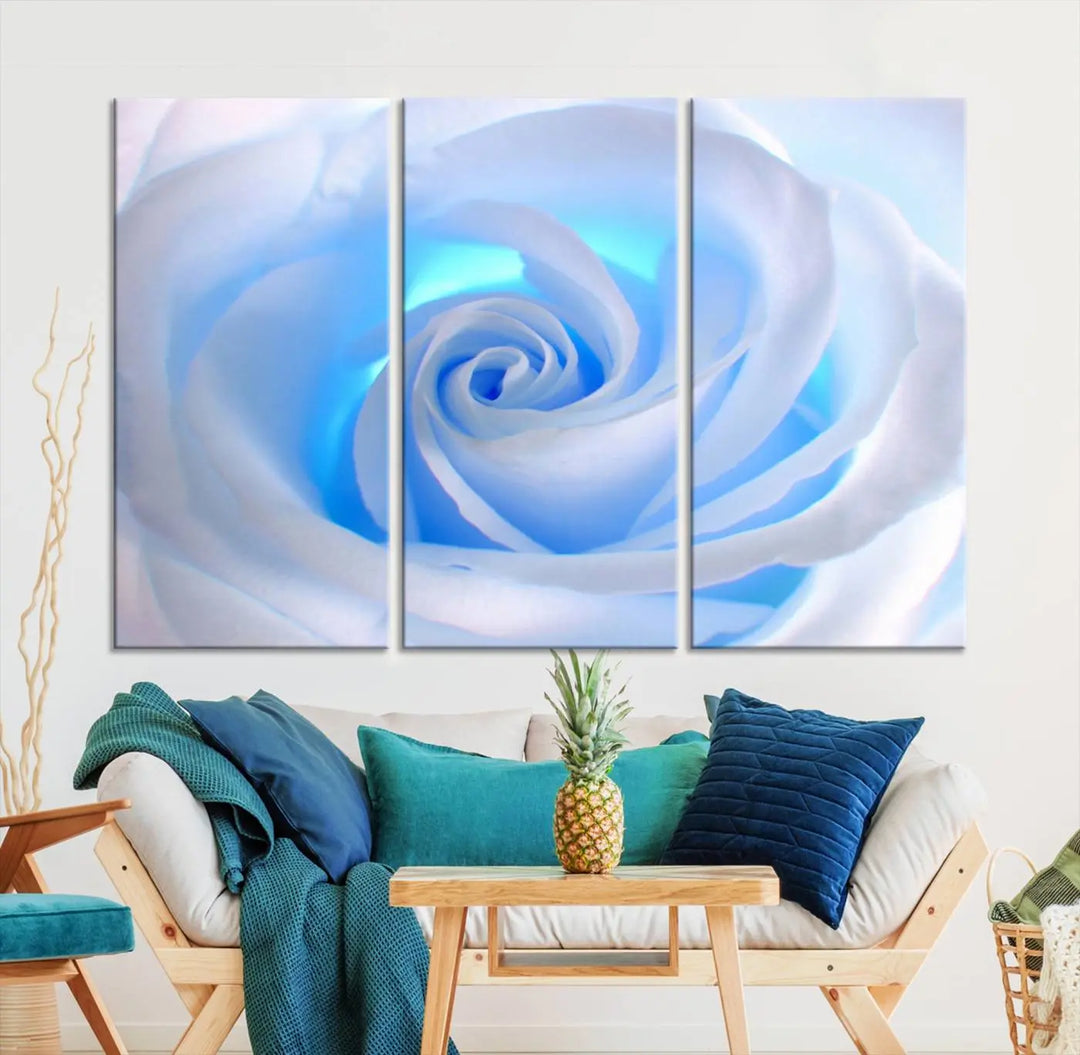 The Blue Rose Wall Art Canvas Print, a museum-quality piece ready to hang, adds charm to the room.