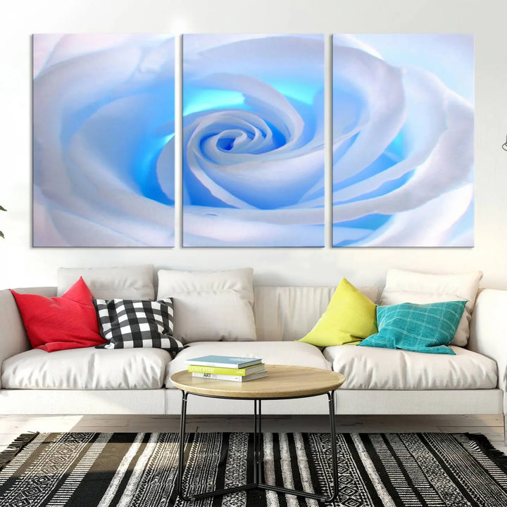 The Blue Rose Wall Art Canvas Print, a museum-quality piece ready to hang, adds charm to the room.