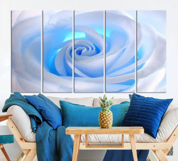 The Blue Rose Wall Art Canvas Print, a museum-quality piece ready to hang, adds charm to the room.