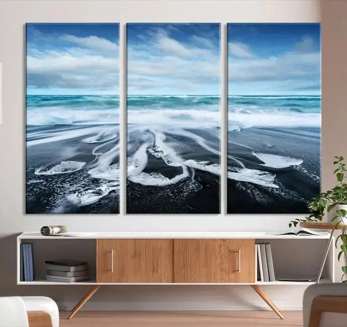 The Blue Sea Bubble Wall Art Canvas Print, featuring a three-panel design of a beach with waves under a cloudy sky, is crafted on museum-quality canvas. Enjoy free shipping on this elegant piece that transforms any space.