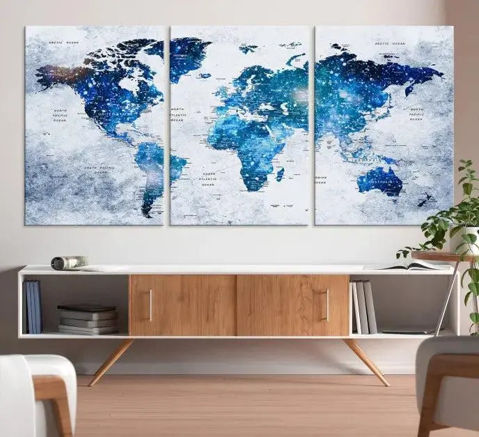 The living room showcases the stunning Blue Sky World Map Canvas Print as wall art.