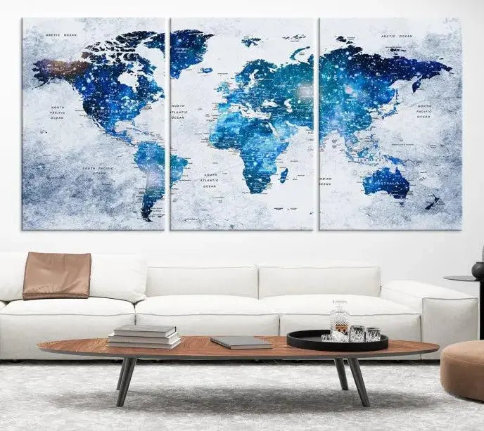 The living room showcases the stunning Blue Sky World Map Canvas Print as wall art.