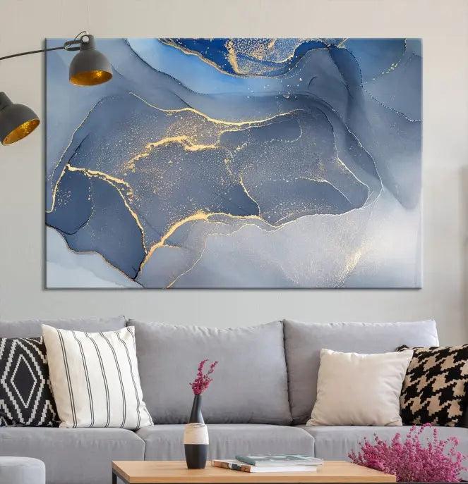 The Blue Wall Art Abstract Canvas Wall Art Print, with its striking blue and gold tones, adds an elegant touch to the room. Crafted on museum-quality canvas, this artwork is ideal for any stylish home. Enjoy the added benefit of free shipping right to your door!