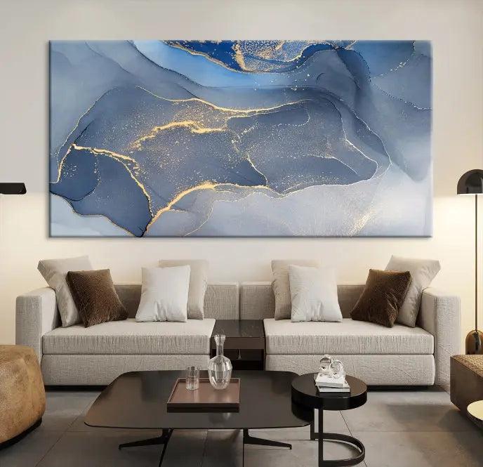 The Blue Wall Art Abstract Canvas Wall Art Print, with its striking blue and gold tones, adds an elegant touch to the room. Crafted on museum-quality canvas, this artwork is ideal for any stylish home. Enjoy the added benefit of free shipping right to your door!