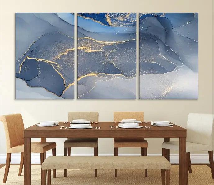 The Blue Wall Art Abstract Canvas Wall Art Print, with its striking blue and gold tones, adds an elegant touch to the room. Crafted on museum-quality canvas, this artwork is ideal for any stylish home. Enjoy the added benefit of free shipping right to your door!