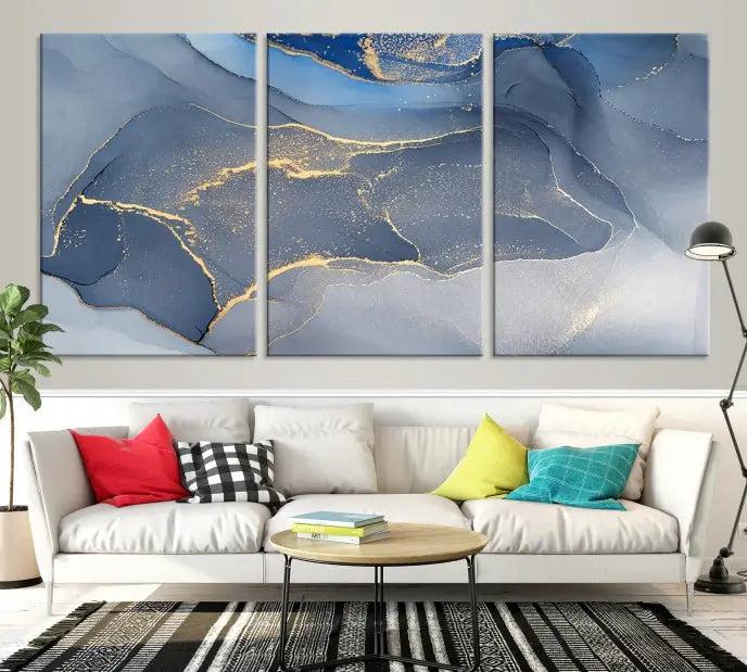 The Blue Wall Art Abstract Canvas Wall Art Print, with its striking blue and gold tones, adds an elegant touch to the room. Crafted on museum-quality canvas, this artwork is ideal for any stylish home. Enjoy the added benefit of free shipping right to your door!