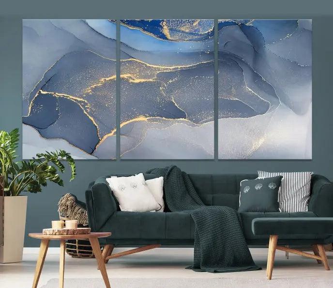 The Blue Wall Art Abstract Canvas Wall Art Print, with its striking blue and gold tones, adds an elegant touch to the room. Crafted on museum-quality canvas, this artwork is ideal for any stylish home. Enjoy the added benefit of free shipping right to your door!