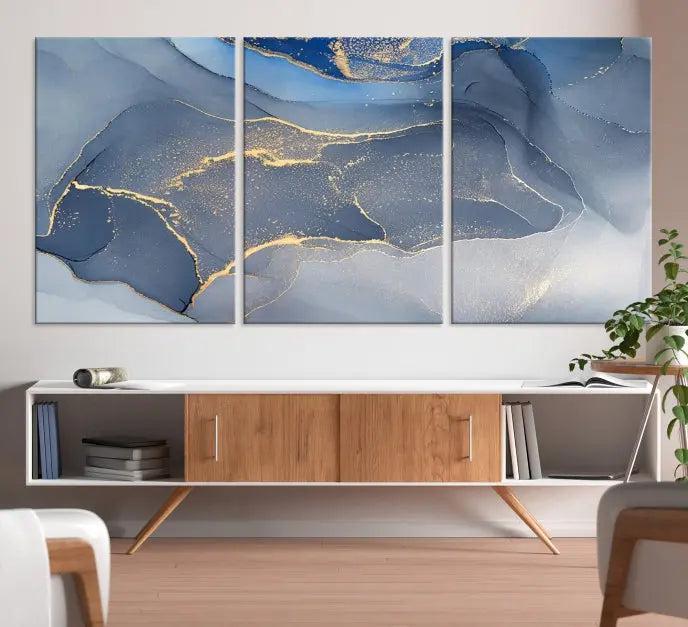 The Blue Wall Art Abstract Canvas Wall Art Print, with its striking blue and gold tones, adds an elegant touch to the room. Crafted on museum-quality canvas, this artwork is ideal for any stylish home. Enjoy the added benefit of free shipping right to your door!