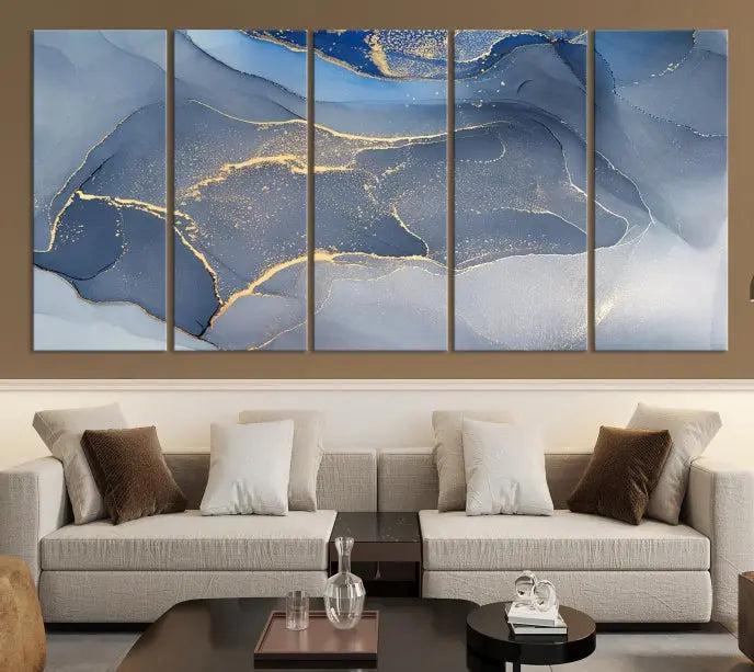 The Blue Wall Art Abstract Canvas Wall Art Print, with its striking blue and gold tones, adds an elegant touch to the room. Crafted on museum-quality canvas, this artwork is ideal for any stylish home. Enjoy the added benefit of free shipping right to your door!