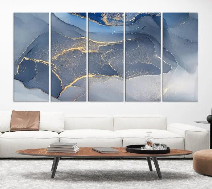 The Blue Wall Art Abstract Canvas Wall Art Print, with its striking blue and gold tones, adds an elegant touch to the room. Crafted on museum-quality canvas, this artwork is ideal for any stylish home. Enjoy the added benefit of free shipping right to your door!