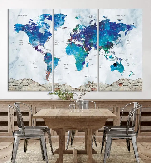 The living room features the striking Blue World Map Canvas Print—a five-panel abstract world map artwork on museum-quality canvas that is ready to hang.