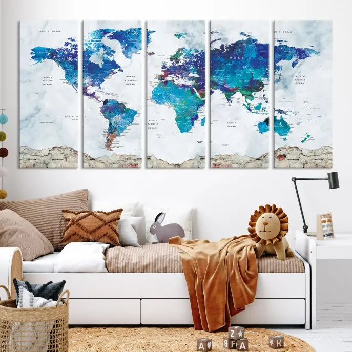 The living room features the striking Blue World Map Canvas Print—a five-panel abstract world map artwork on museum-quality canvas that is ready to hang.