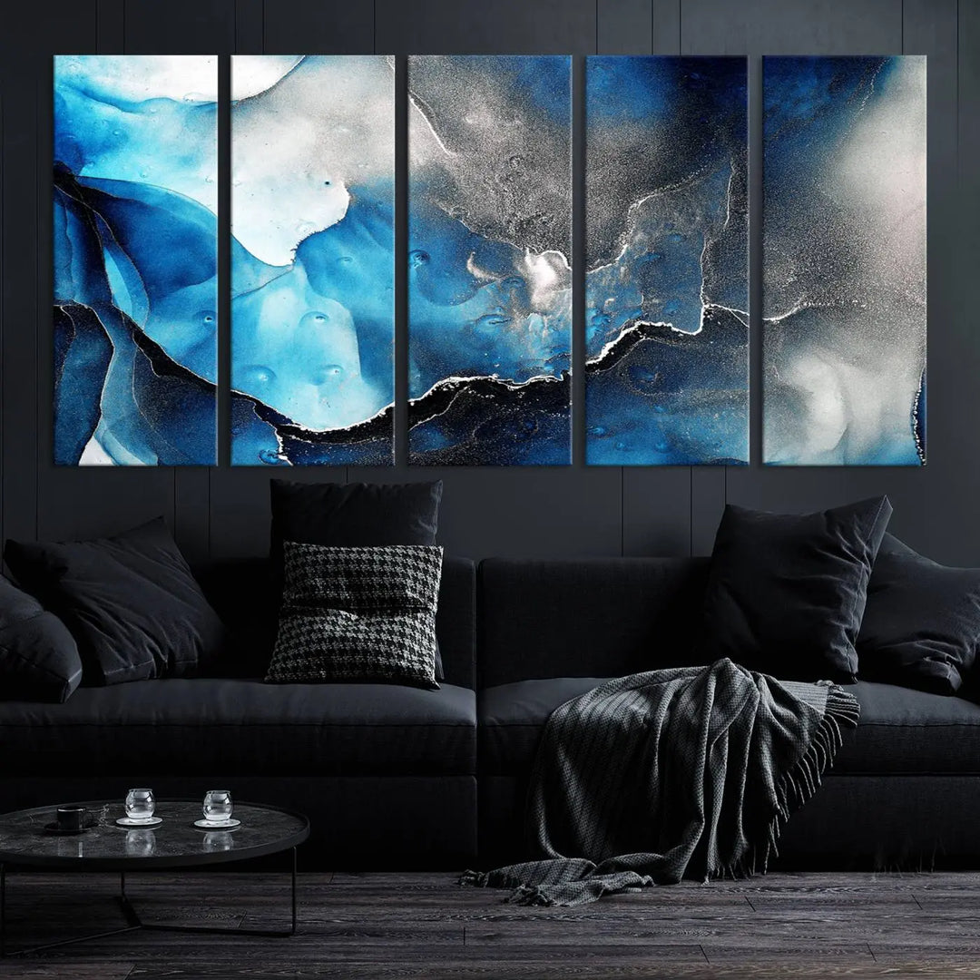 The Blue and Black Marble Fluid Effect Wall Art Abstract Canvas Prints feature three dynamic swirling patterns in blue, black, and white. Crafted on museum-quality canvases and enhanced with a UV-protective coating, these prints maintain their vibrant allure over time.