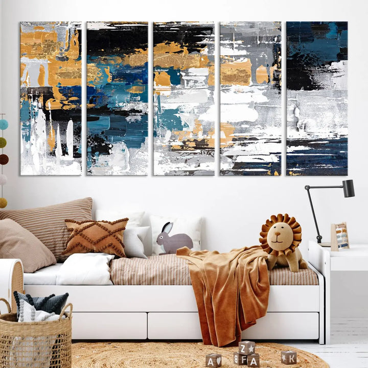 The Blue and Gold Abstract Canvas Wall Art – a triptych modern painting that's framed and ready to hang – features captivating brush strokes in blue, gold, black, and white to enhance the living room decor.