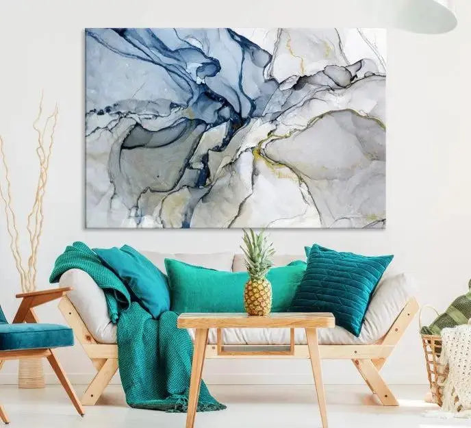 The "Blue and Gray Marble Fluid Effect Wall Art Abstract Canvas Wall Art Print" graces the dark wall, ready to hang. This triptych abstract art boasts a UV-protective coating for vibrant longevity in your space.