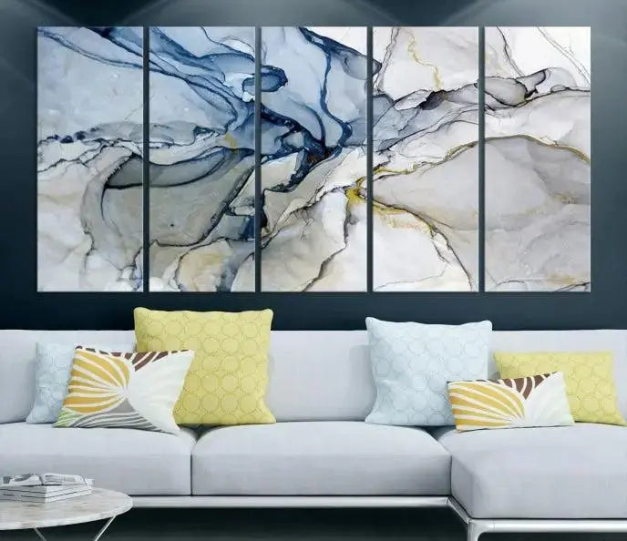 The "Blue and Gray Marble Fluid Effect Wall Art Abstract Canvas Wall Art Print" graces the dark wall, ready to hang. This triptych abstract art boasts a UV-protective coating for vibrant longevity in your space.