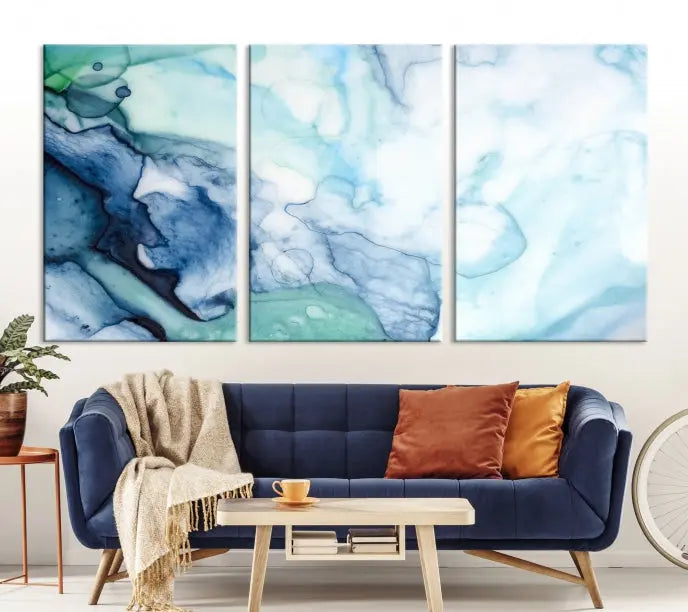 The Blue and Green Marble Fluid Effect Wall Art Abstract Canvas Wall Art Print, gallery wrapped on museum-quality canvas, adorns the black wall.