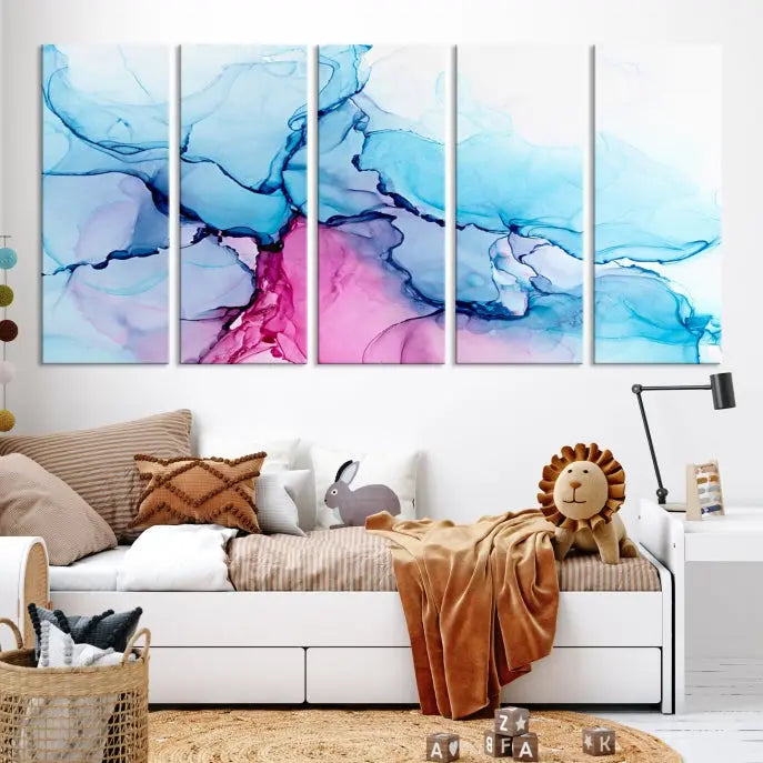 The "Blue and Pink Marble Fluid Effect Wall Art Abstract Canvas Wall Art Print" graces a dark wall. This exquisite piece is created on museum-quality polycotton canvas with a UV-protective coating.