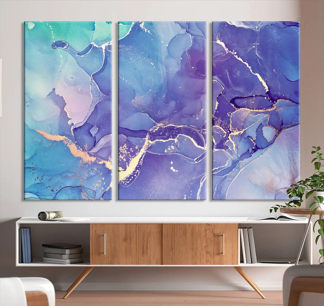 A Blue and Purple Marble Fluid Effect Wall Art Abstract Canvas Print graces the wall. This gallery-wrapped masterpiece is crafted on museum-quality polycotton and finished with a UV-protective coating for enduring brilliance.