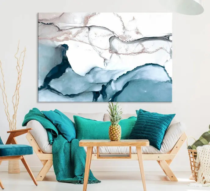 The modern living room features the Blue and Rose Gold Marble Fluid Effect Wall Art Abstract Canvas Art Print displayed on a gray wall.