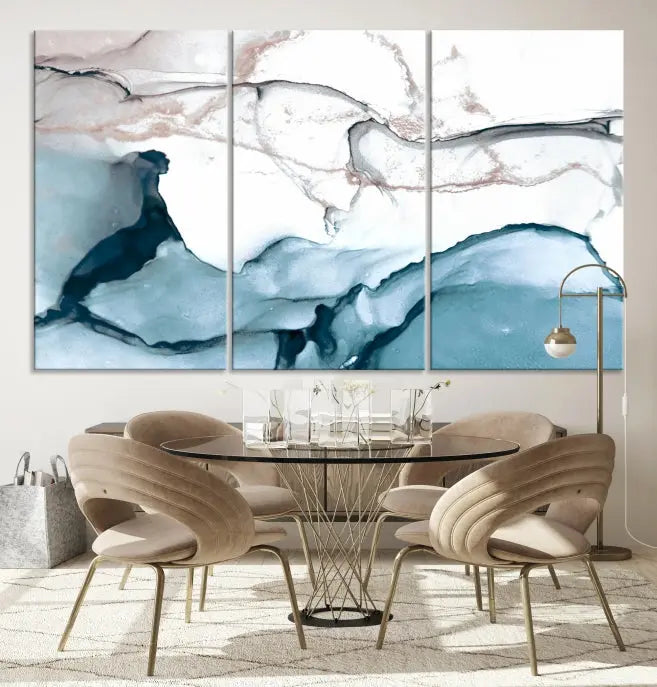 The modern living room features the Blue and Rose Gold Marble Fluid Effect Wall Art Abstract Canvas Art Print displayed on a gray wall.