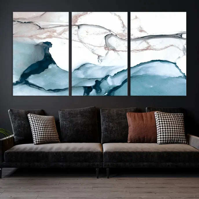 The modern living room features the Blue and Rose Gold Marble Fluid Effect Wall Art Abstract Canvas Art Print displayed on a gray wall.