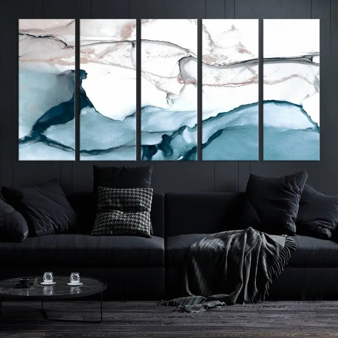 The modern living room features the Blue and Rose Gold Marble Fluid Effect Wall Art Abstract Canvas Art Print displayed on a gray wall.