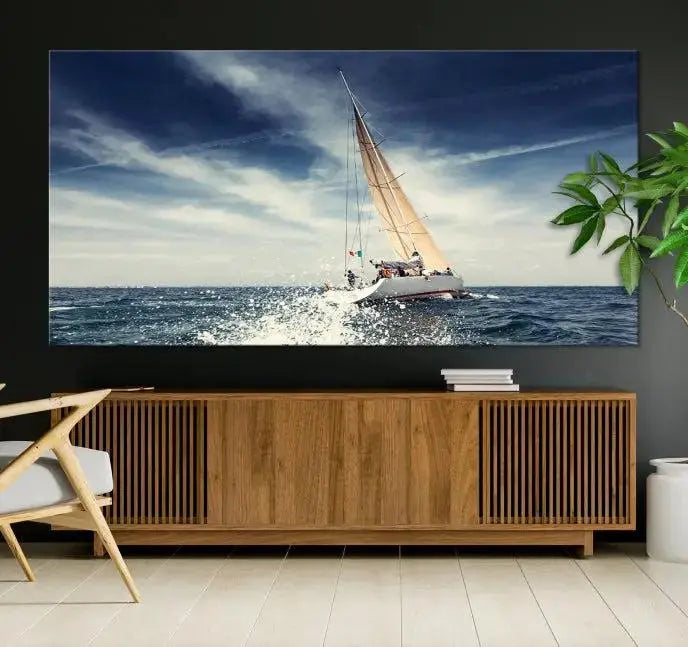 The "Boat on the Sea" wall art, featuring a sailboat on the ocean, adds elegance to a cozy living room with its gallery-wrapped canvas. This museum-quality piece shines brilliantly and is protected by a UV-coating to ensure its lasting beauty.