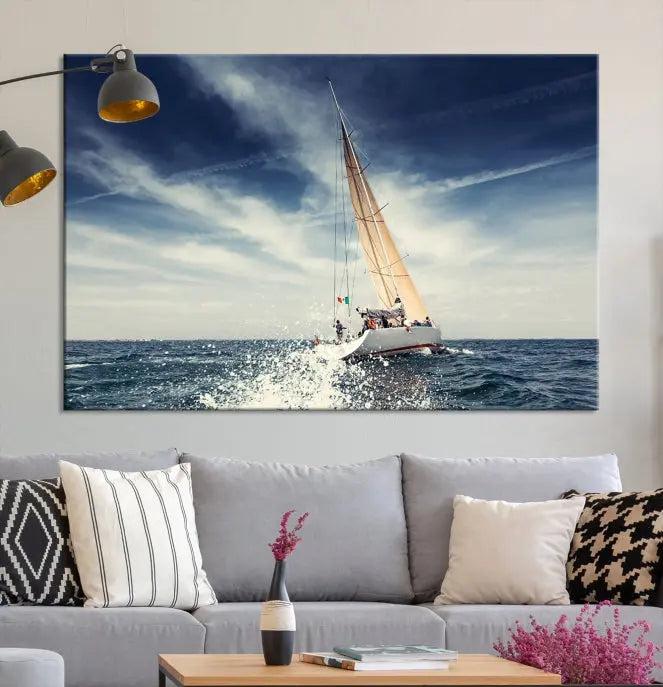 The "Boat on the Sea" wall art, featuring a sailboat on the ocean, adds elegance to a cozy living room with its gallery-wrapped canvas. This museum-quality piece shines brilliantly and is protected by a UV-coating to ensure its lasting beauty.