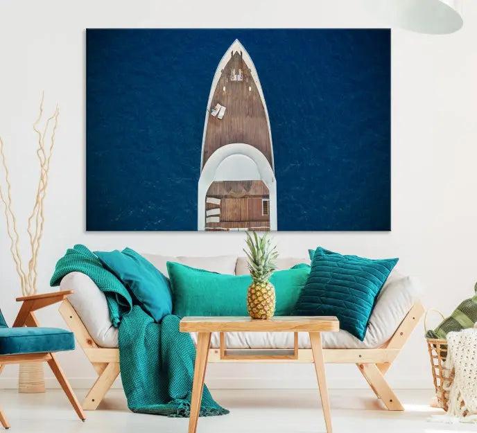 The Boat on the Sea Wall Art Canvas Print, depicting an aerial view of a yacht on ocean water, adds elegance to any room. This triptych is crafted on museum-quality canvas, ready to hang, and includes a UV-protective coating for enduring vibrancy.