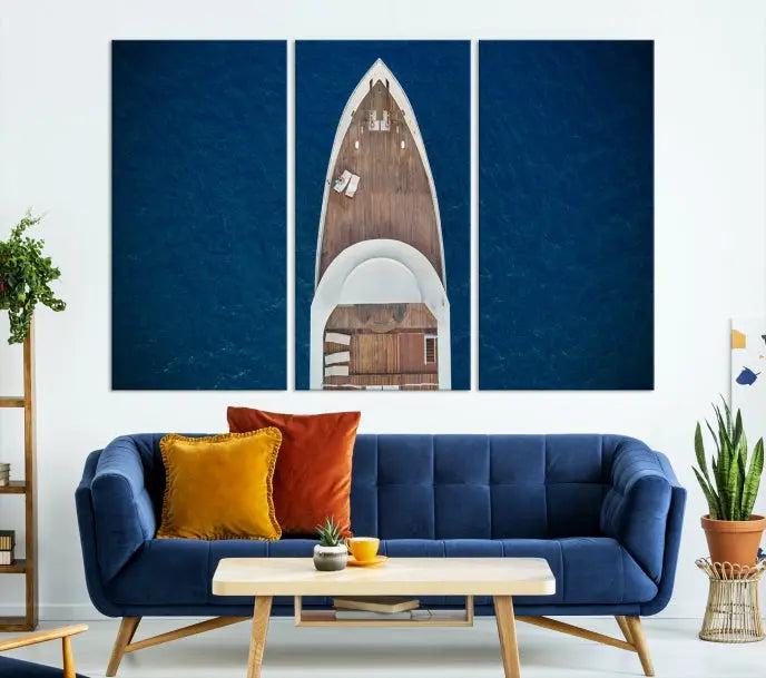 The Boat on the Sea Wall Art Canvas Print, depicting an aerial view of a yacht on ocean water, adds elegance to any room. This triptych is crafted on museum-quality canvas, ready to hang, and includes a UV-protective coating for enduring vibrancy.