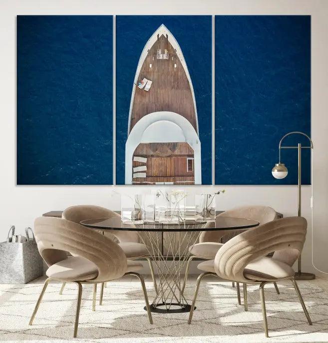 The Boat on the Sea Wall Art Canvas Print, depicting an aerial view of a yacht on ocean water, adds elegance to any room. This triptych is crafted on museum-quality canvas, ready to hang, and includes a UV-protective coating for enduring vibrancy.