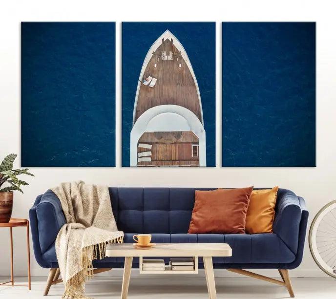 The Boat on the Sea Wall Art Canvas Print, depicting an aerial view of a yacht on ocean water, adds elegance to any room. This triptych is crafted on museum-quality canvas, ready to hang, and includes a UV-protective coating for enduring vibrancy.