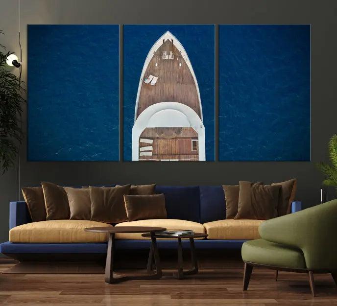 The Boat on the Sea Wall Art Canvas Print, depicting an aerial view of a yacht on ocean water, adds elegance to any room. This triptych is crafted on museum-quality canvas, ready to hang, and includes a UV-protective coating for enduring vibrancy.